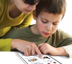 boy-looking-at-image-the-woman-is-pointing-to-in-the-book boy-looking-at-image-the-woman-is-pointing-to-in-the-book