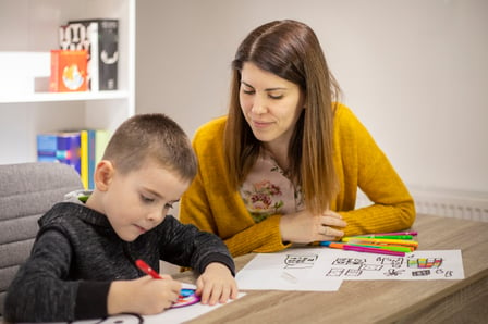 ABA therapist for autism working with a student