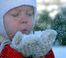 boy with autism enjoying holiday outside with snow.jpg