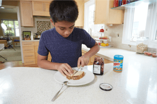 autistic boy sequencing making sandwich