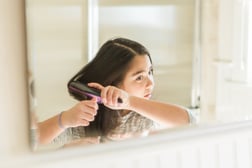 girl-brushing-hair