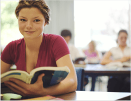girl-reading-book-classroom.png