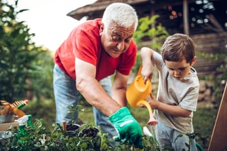 boy-and-grandfather-gardening-together