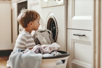 boy-helping-with-laundry