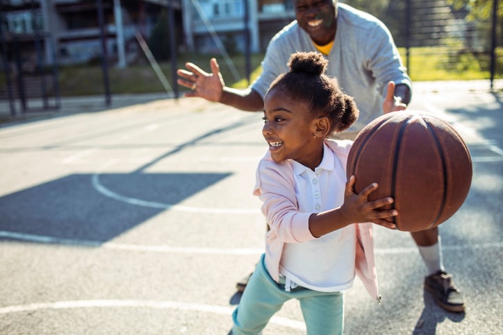 daughter-playing-basketball-with-dad
