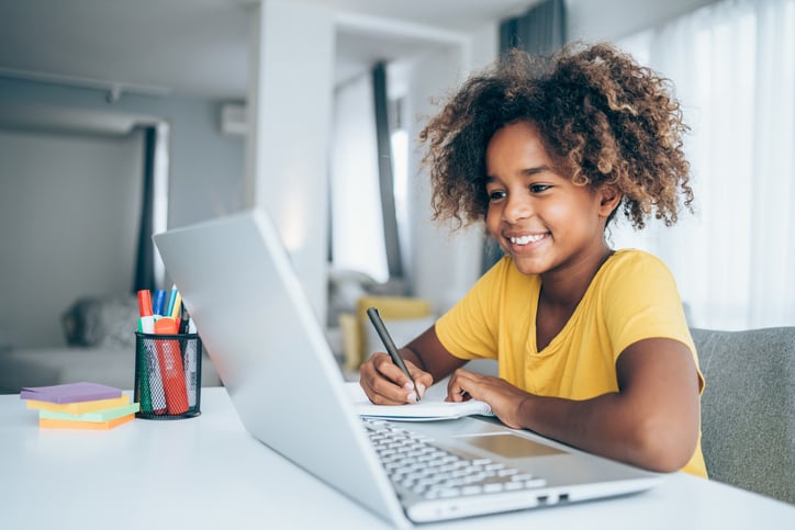 girl with autism participating in class on Zoom