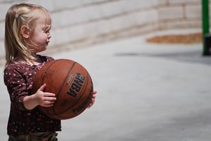 child-with-autism-holding-basketball