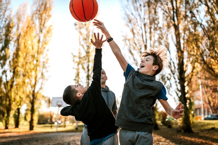 boys with autism playing basketball