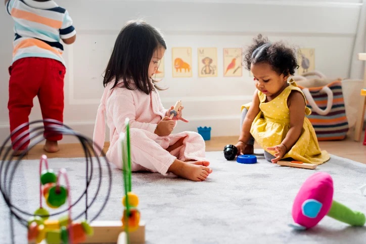 Little kids autism mixed races playing toys in the playroom