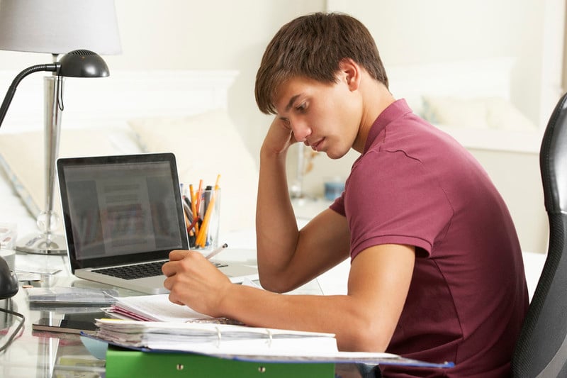teenage boy studying